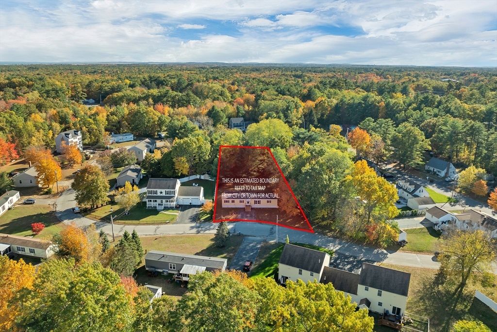 28 Brooks Road, Unit 28 Seabrook, NH 03874 - Photo 30 of 34 an aerial view of a houses with outdoor space