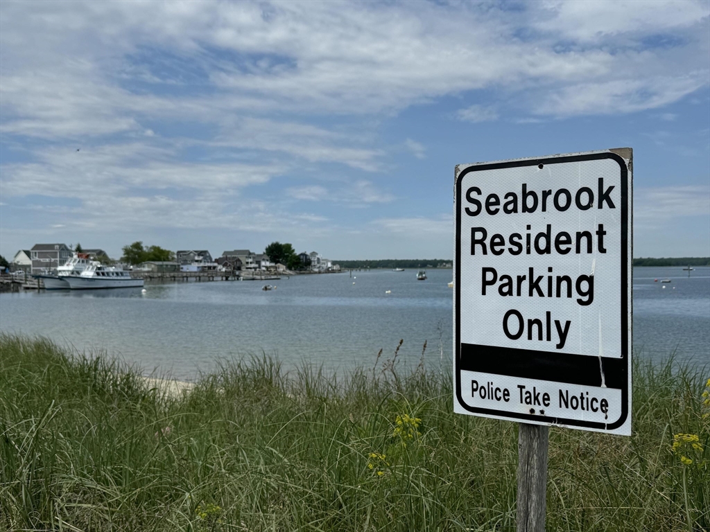 28 Brooks Road, Unit 28 Seabrook, NH 03874 - Photo 33 of 34 a sign that is on the wall of a building