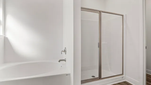 a bathroom with a double vanity sink and mirror