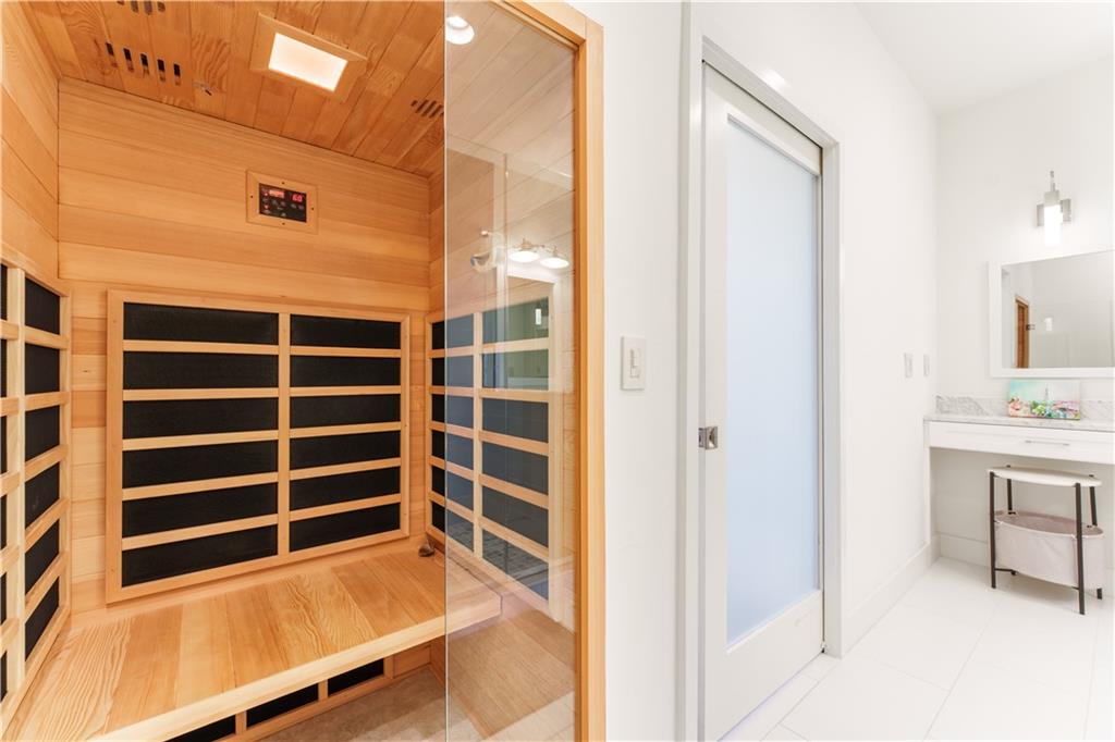 3475 Oak Valley Road Northeast, Unit 2940 Atlanta, GA 30326 - Photo 14 of 26 a view of a walk in closet and living room