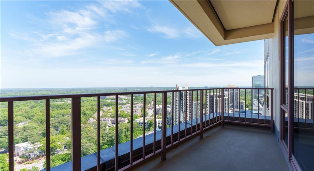 3475 Oak Valley Road Northeast, Unit 2940 Atlanta, GA 30326 - Photo 20 of 26 a view of a balcony with furniture