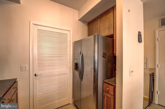 a bathroom with a shower and a mirror