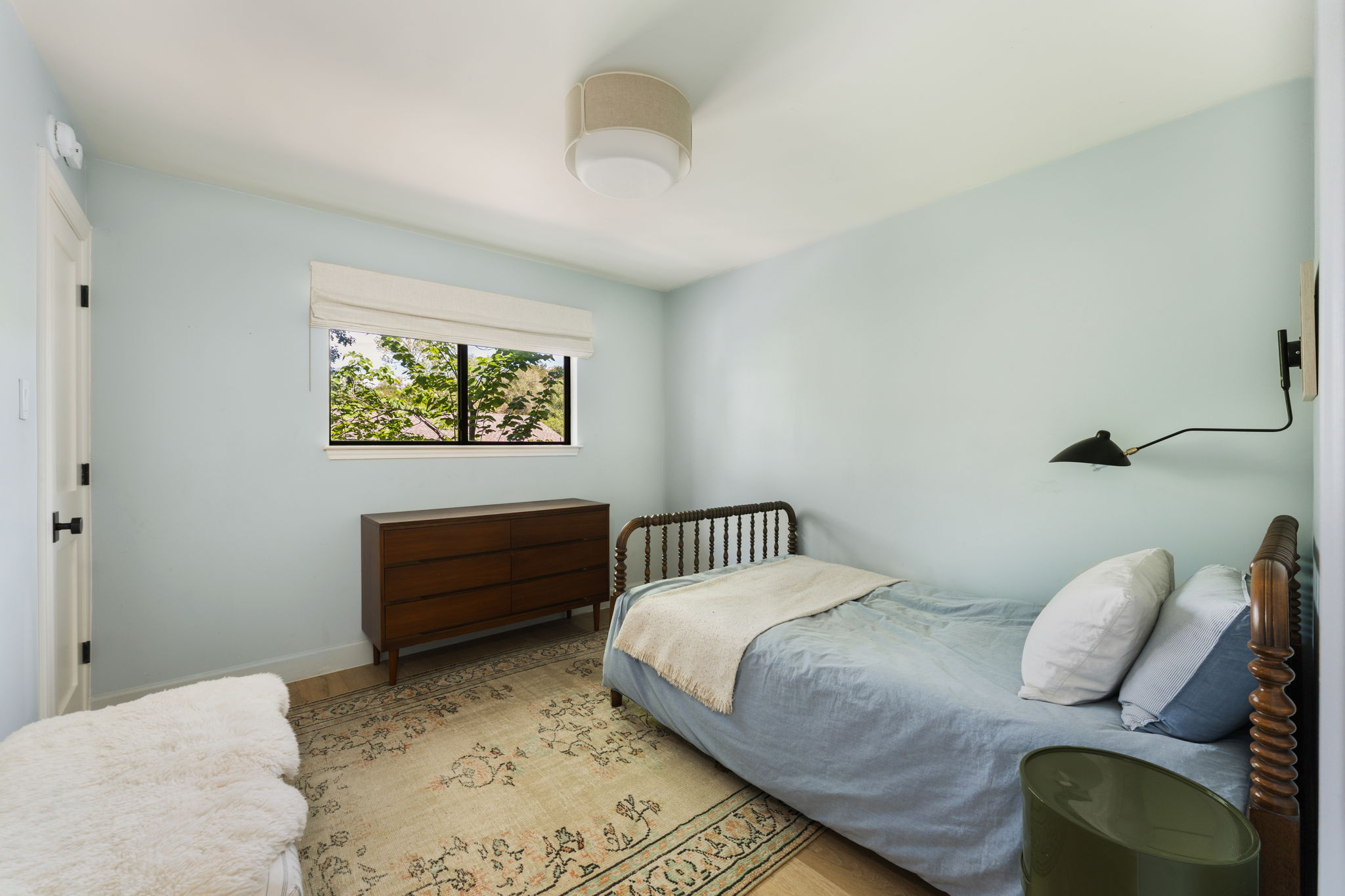 9101 Echo Point Cove Austin, TX 78759 - Photo 22 of 34 a bedroom with a bed and a window