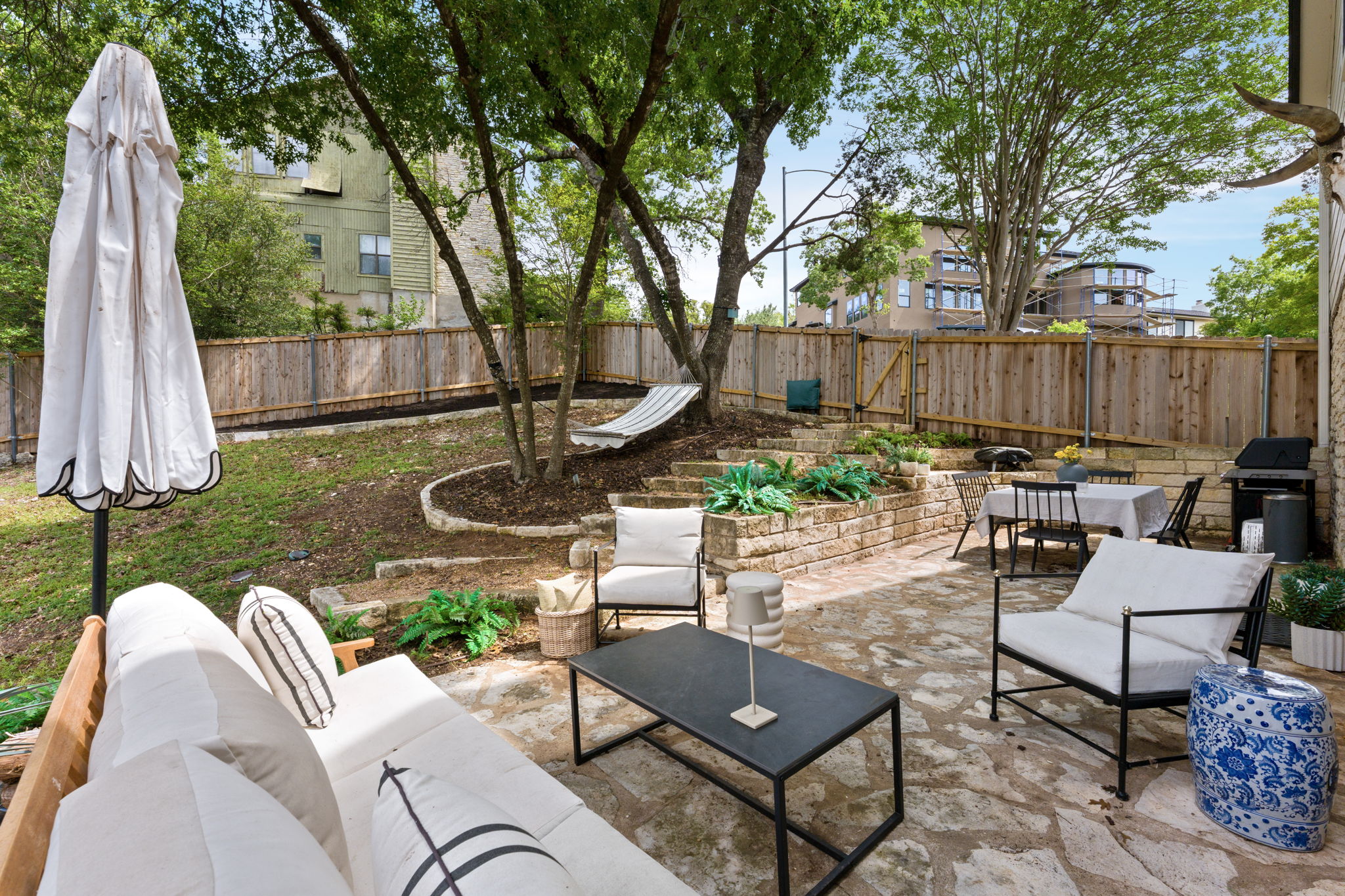 9101 Echo Point Cove Austin, TX 78759 - Photo 30 of 34 a view of a backyard with furniture