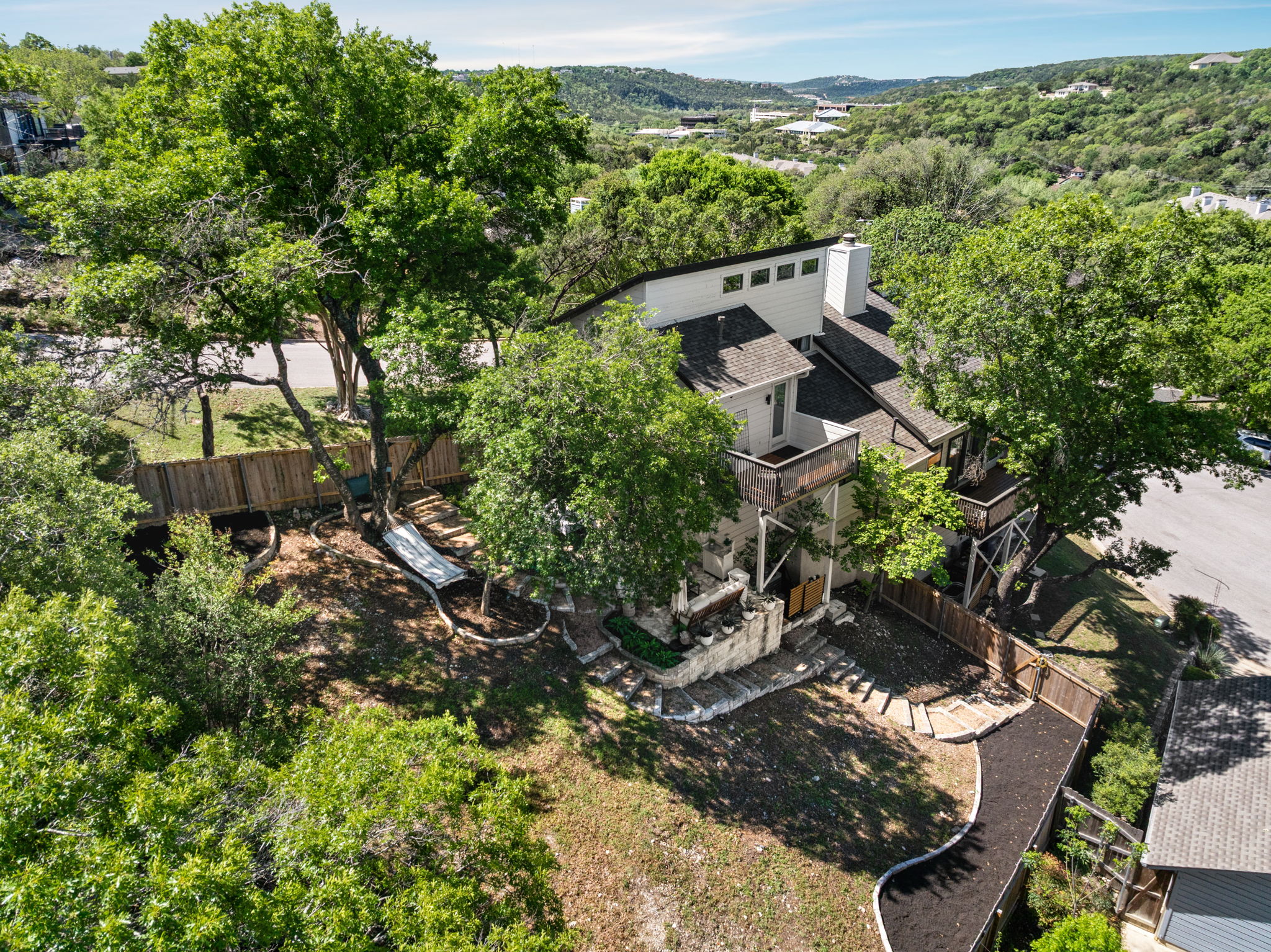 9101 Echo Point Cove Austin, TX 78759 - Photo 33 of 34 an aerial view of a house with a yard