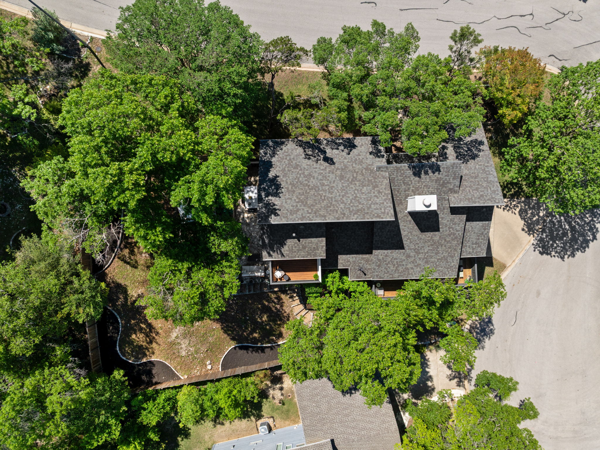 9101 Echo Point Cove Austin, TX 78759 - Photo 34 of 34 an aerial view of a house with yard and outdoor space