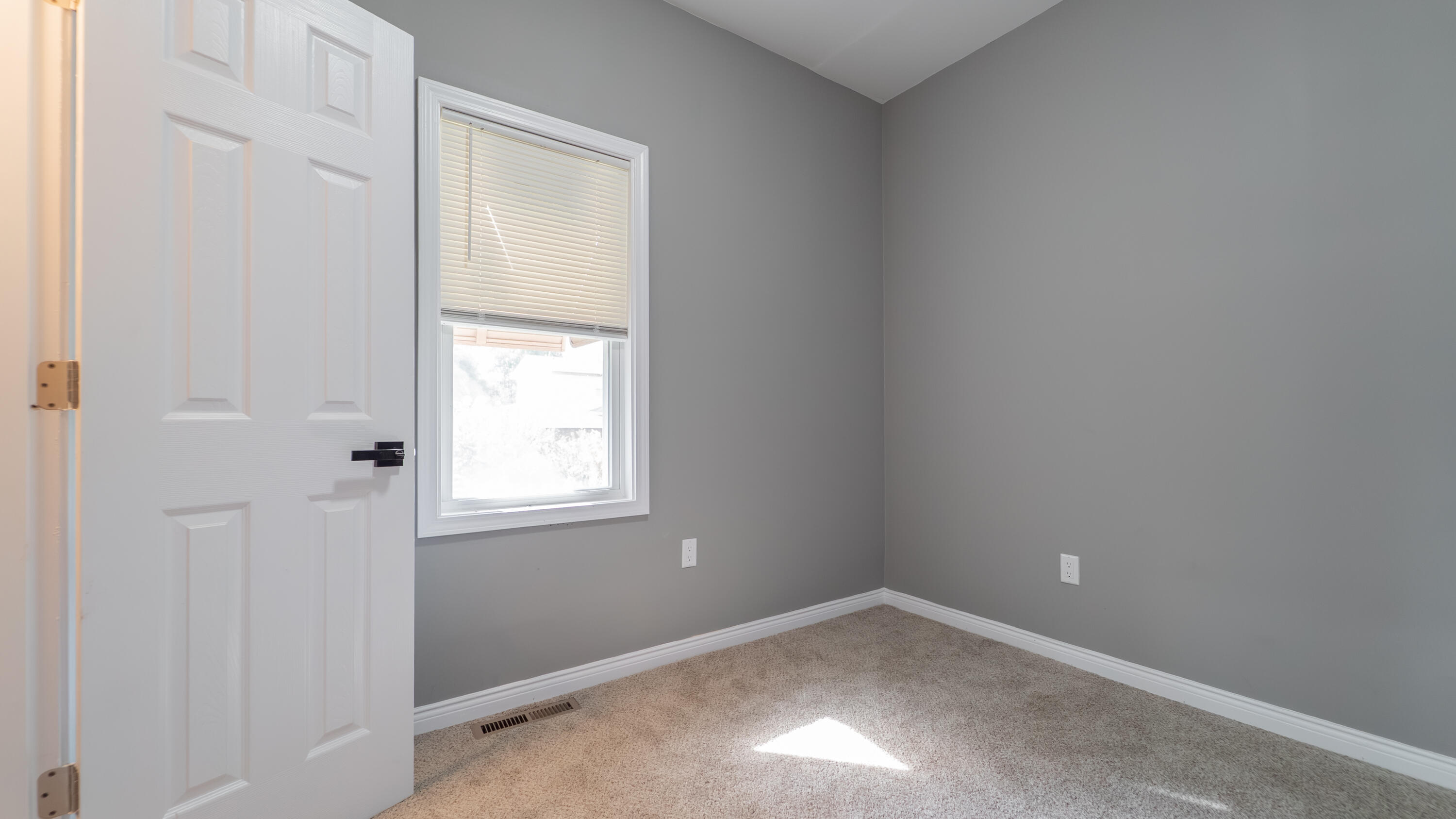 2257 West 16th Avenue Gary, IN 46404 - Photo 11 of 24 an empty room with a window