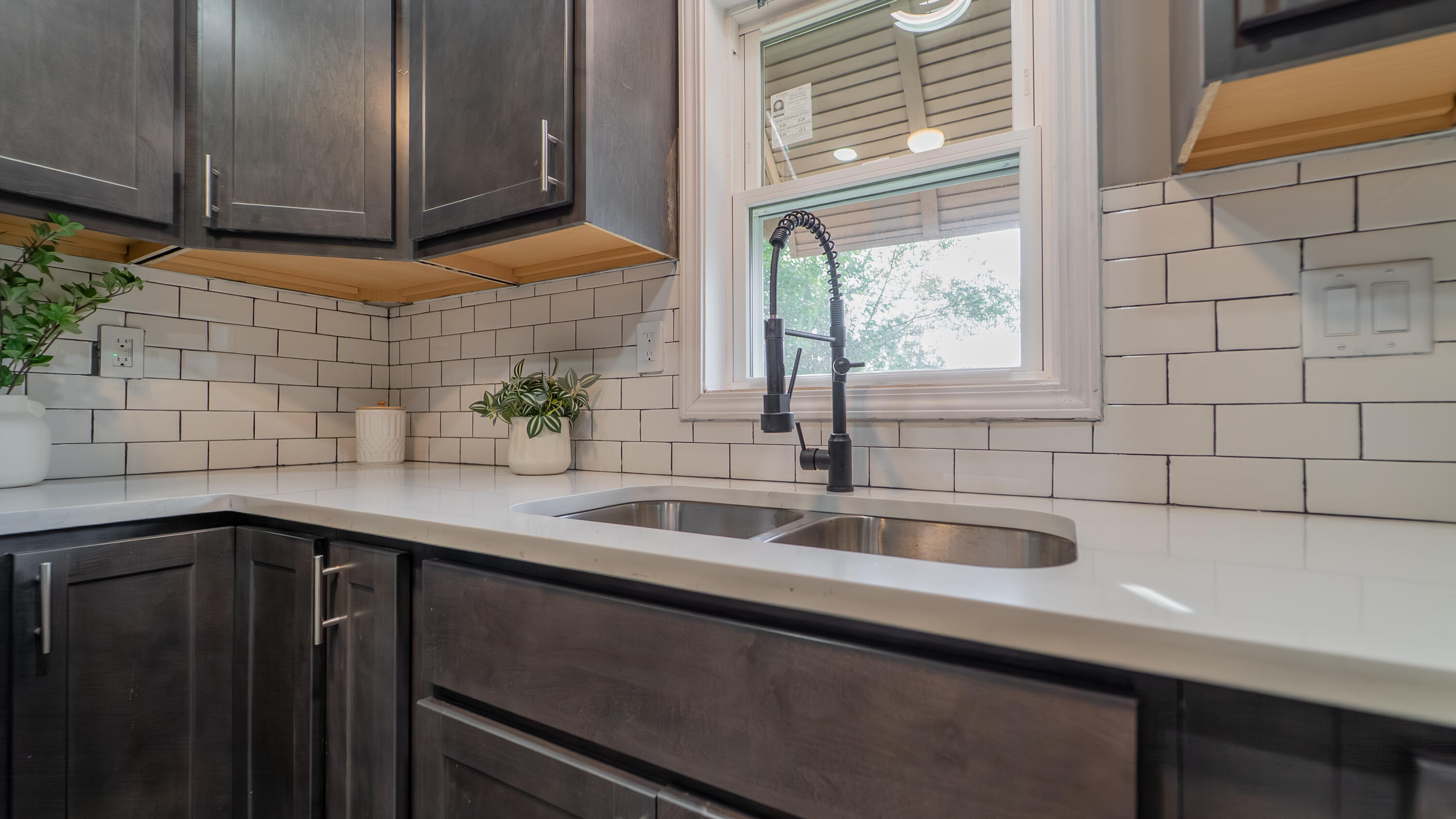 2257 West 16th Avenue Gary, IN 46404 - Photo 13 of 24 a kitchen with a sink and cabinets