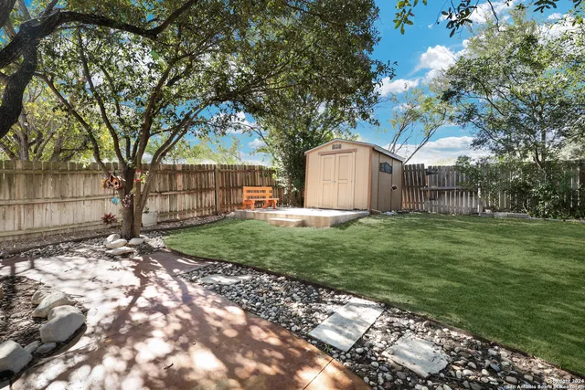 a front view of house with garden