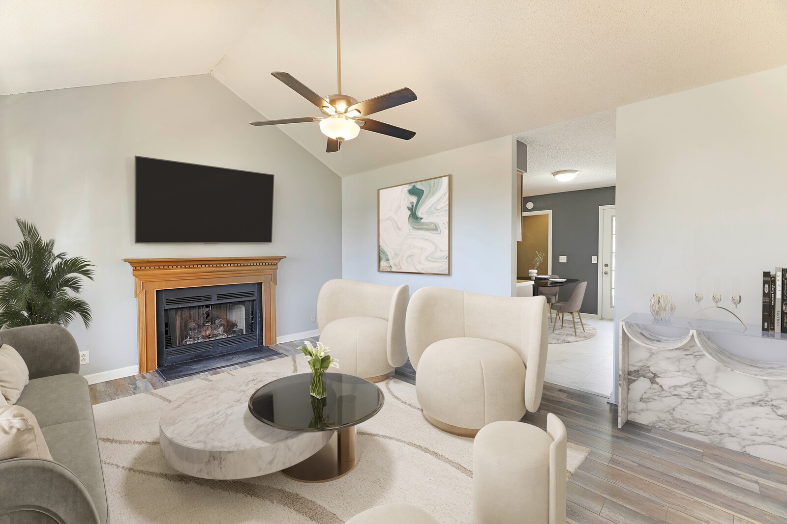 185 Bonnafield Drive Hermitage, TN 37076 - Photo 2 of 42 a living room with furniture a fireplace and a flat screen tv