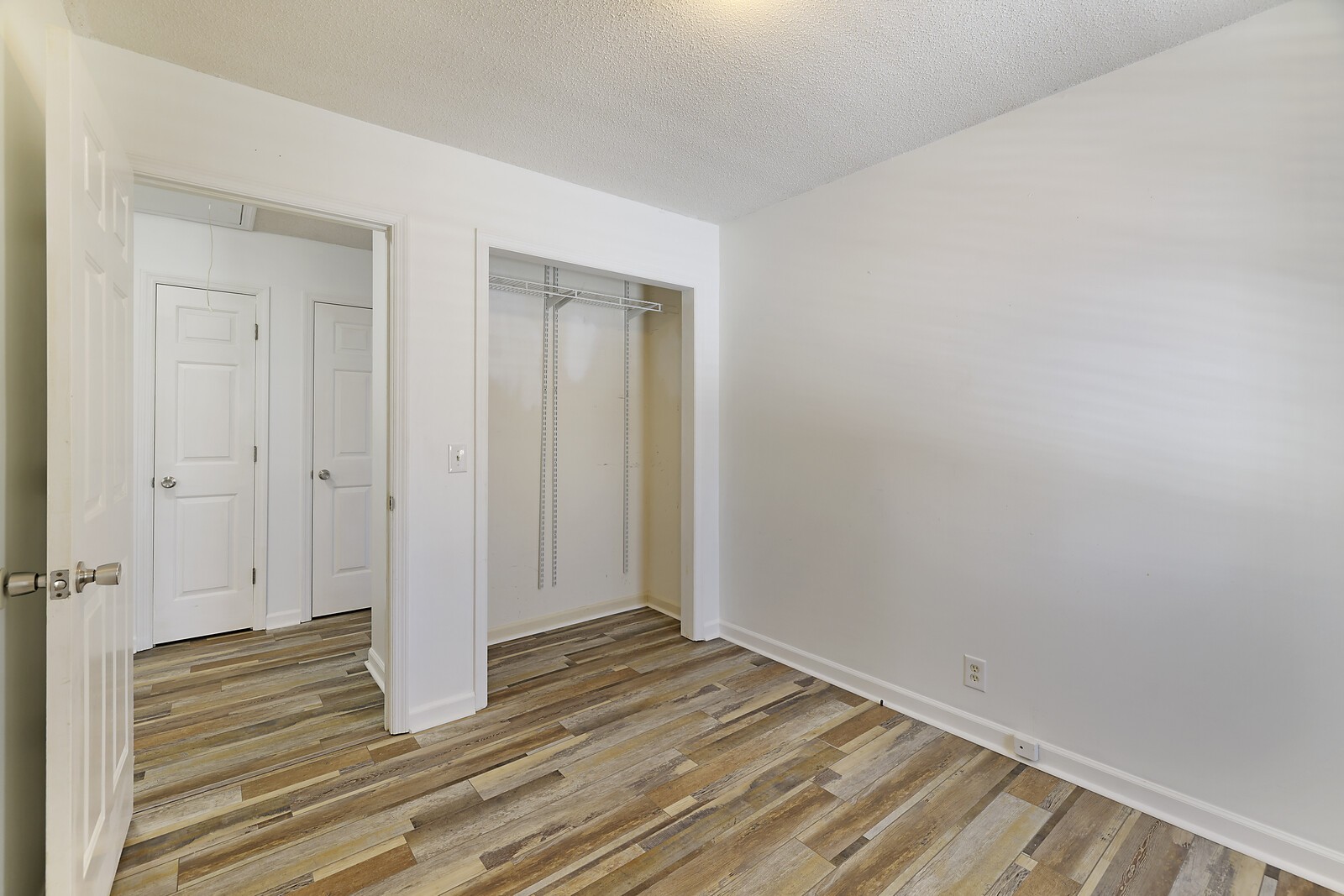 185 Bonnafield Drive Hermitage, TN 37076 - Photo 21 of 42 a view of a livingroom with wooden floor and bathroom