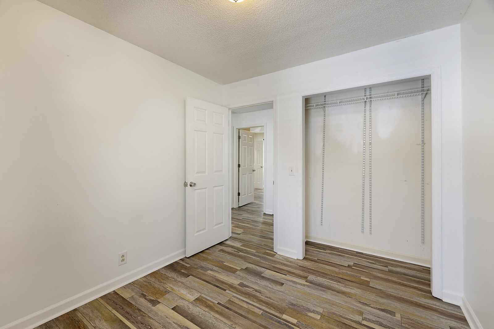 185 Bonnafield Drive Hermitage, TN 37076 - Photo 22 of 42 a view of a livingroom with wooden floor and closet