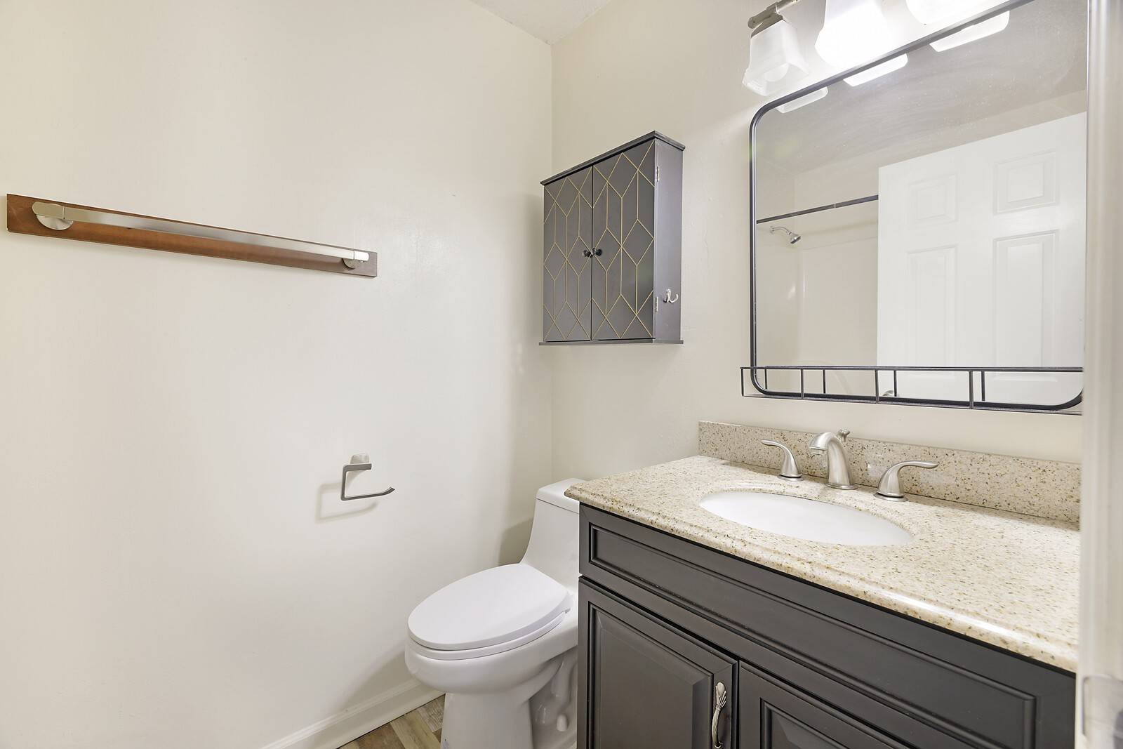 185 Bonnafield Drive Hermitage, TN 37076 - Photo 26 of 42 a bathroom with a sink a toilet and mirror