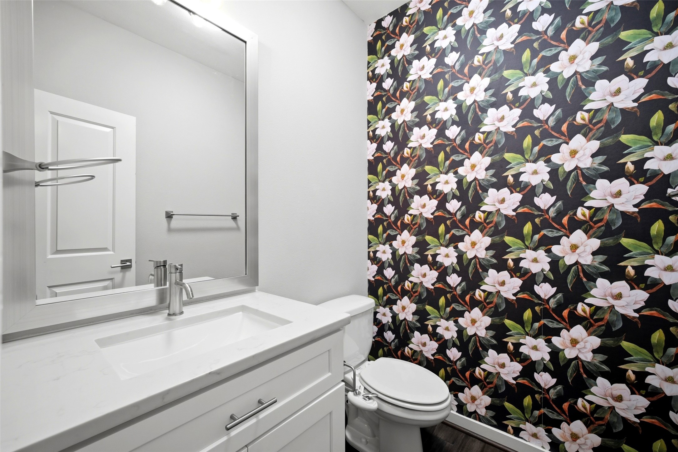 605 Dumble Street Houston, TX 77023 - Photo 39 of 44 a bathroom with a sink a toilet and a mirror
