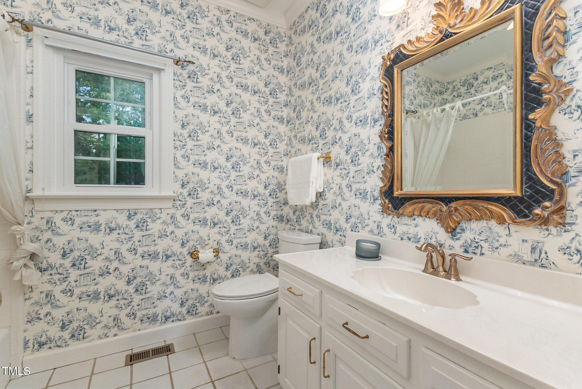 6909 Brook Ridge Court Raleigh, NC 27615 - Photo 37 of 60 Main level full bath