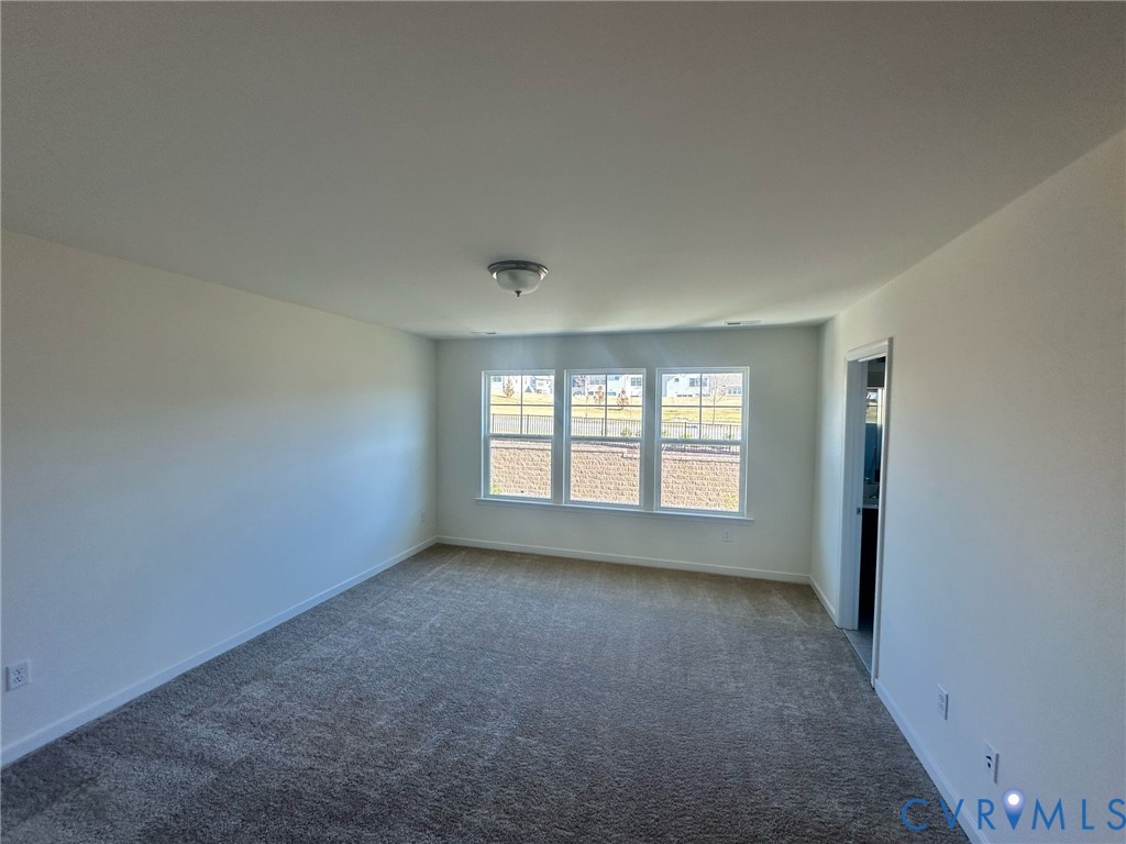 12737 Deep Wl Road Midlothian, VA 23112 - Photo 13 of 17 an empty room with a empty space and windows