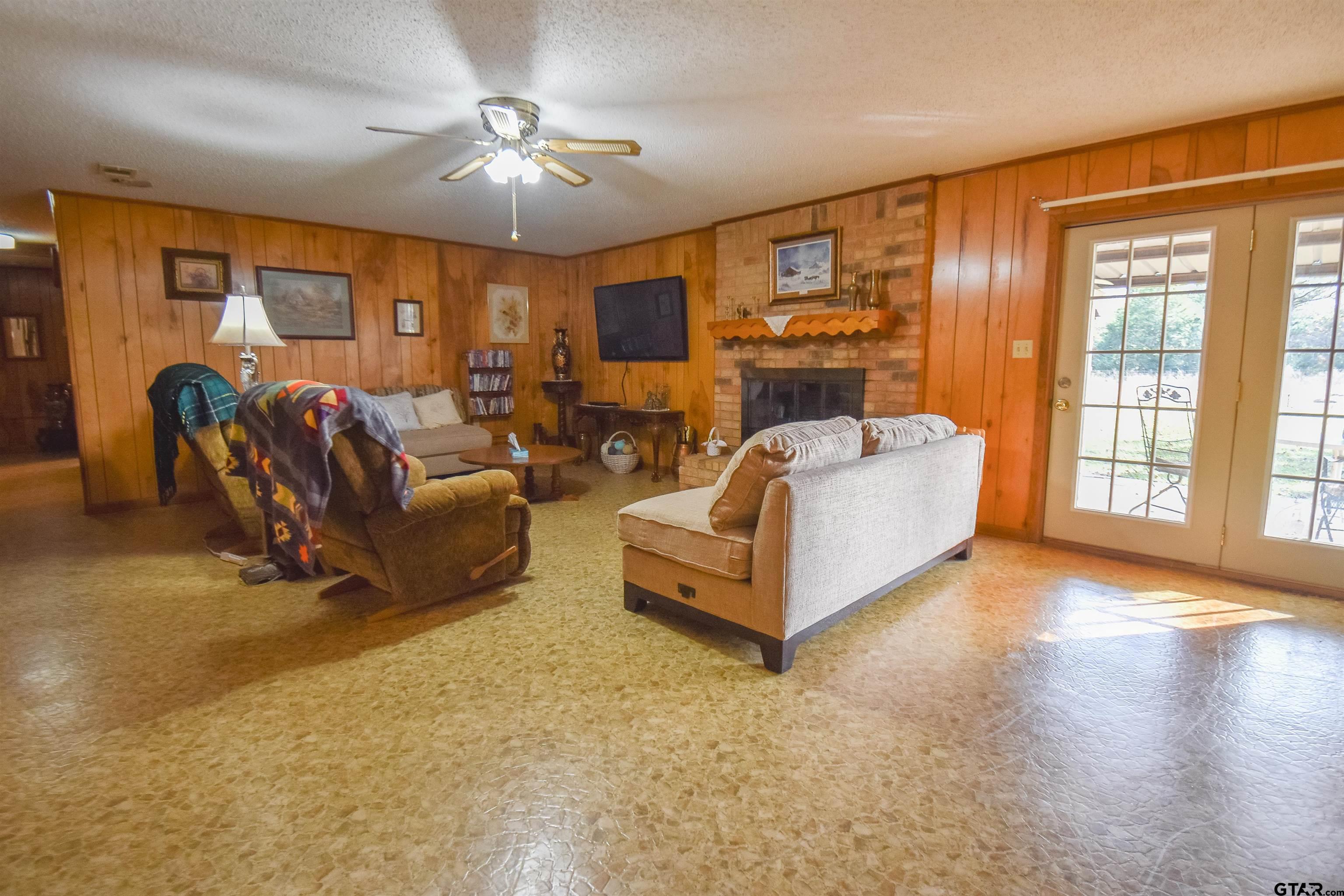 355 West Sugar Hill Road Reklaw, TX 75784 - Photo 12 of 38 a living room with furniture and a large window