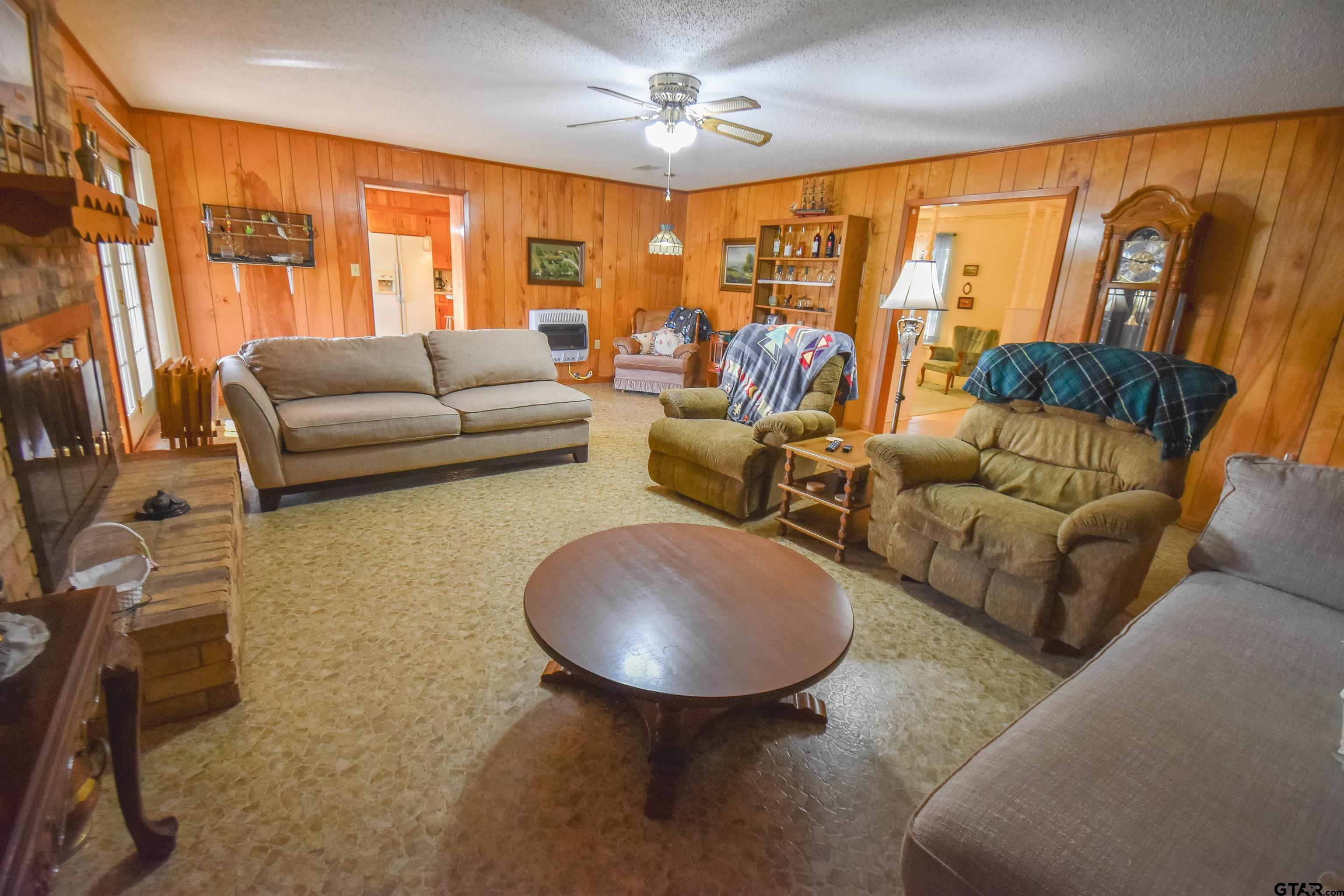355 West Sugar Hill Road Reklaw, TX 75784 - Photo 15 of 38 a living room with furniture and a large window