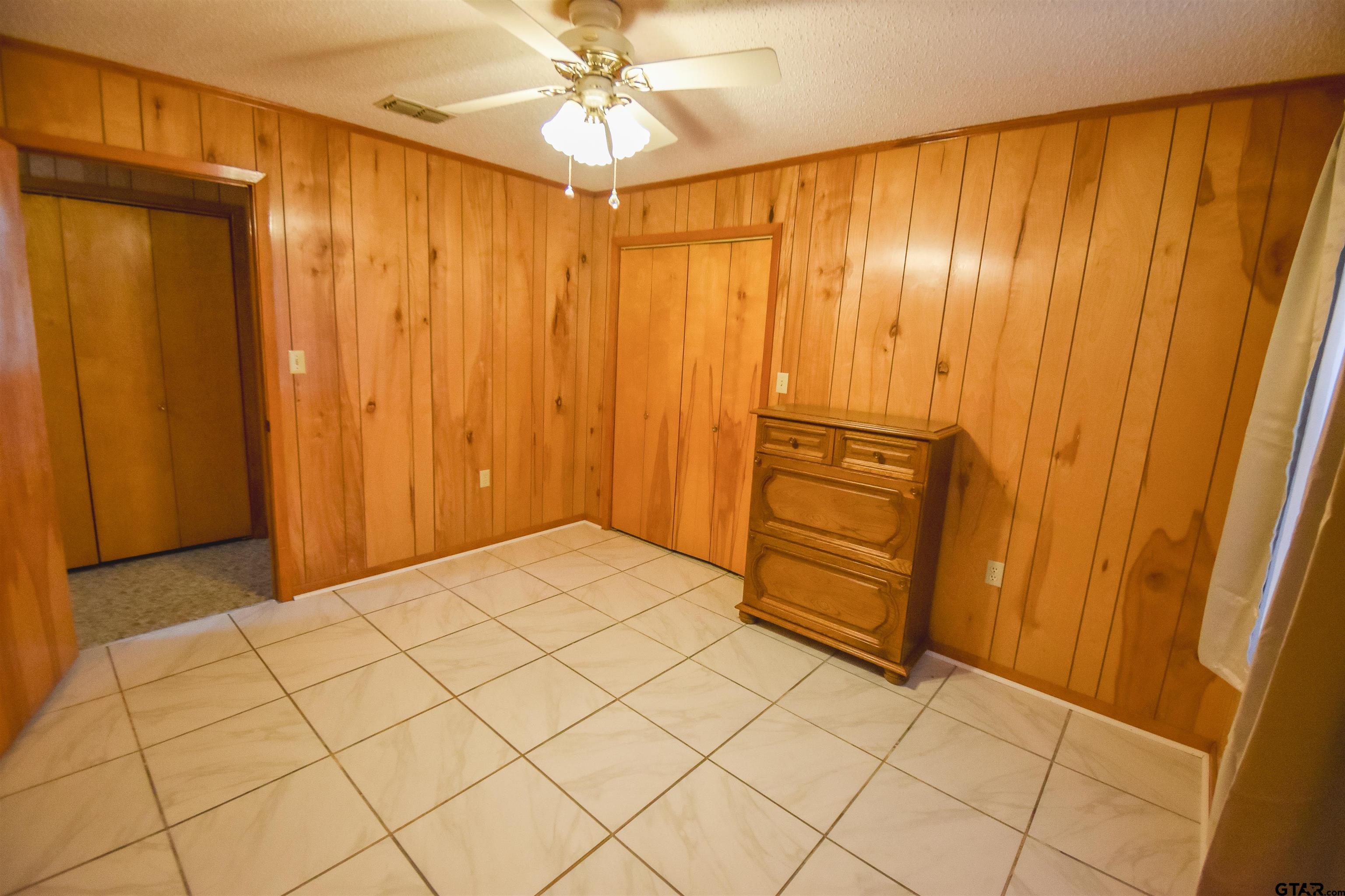 355 West Sugar Hill Road Reklaw, TX 75784 - Photo 23 of 38 a view of a room with wooden walls
