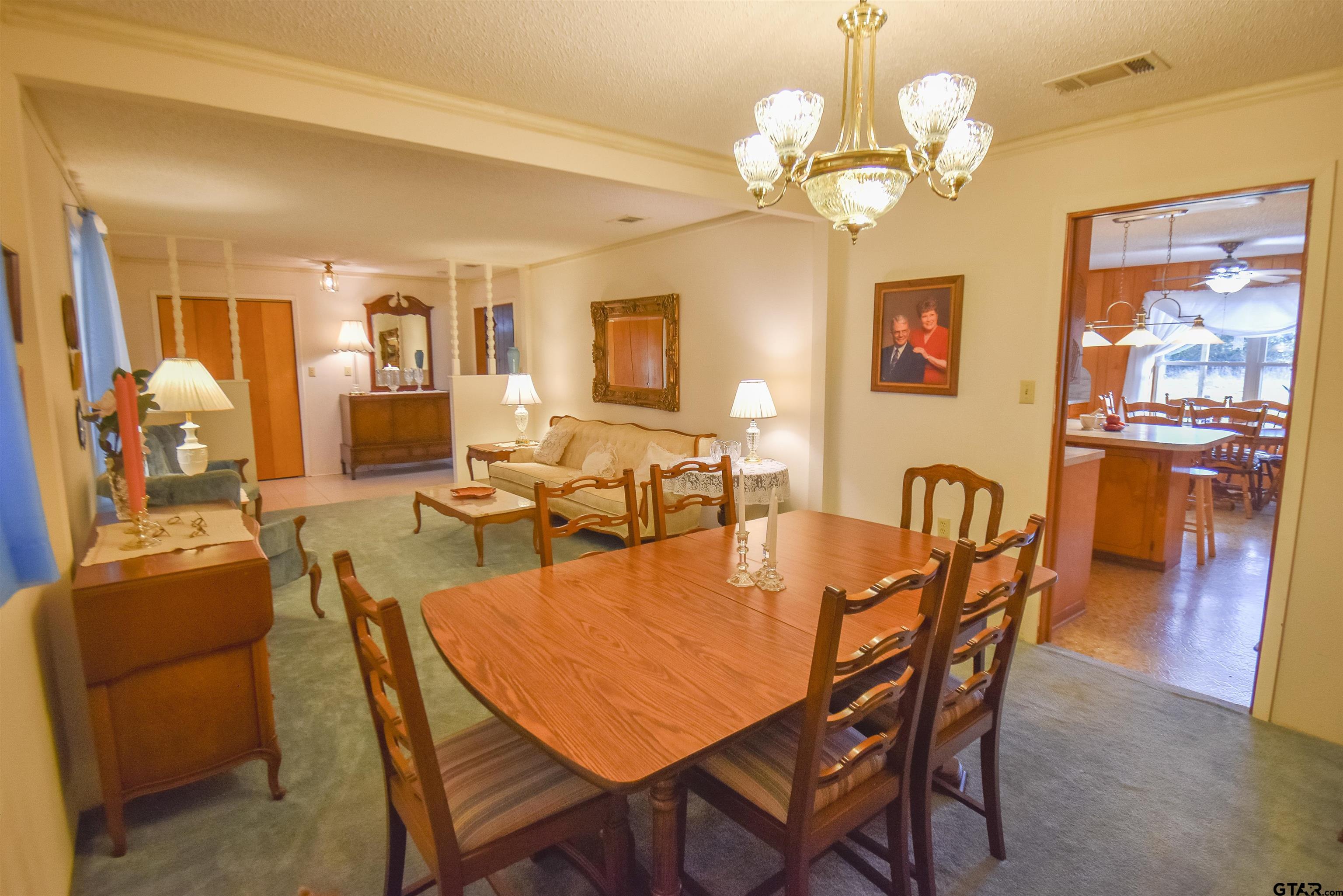 355 West Sugar Hill Road Reklaw, TX 75784 - Photo 6 of 38 a view of a dining room with furniture and wooden floor