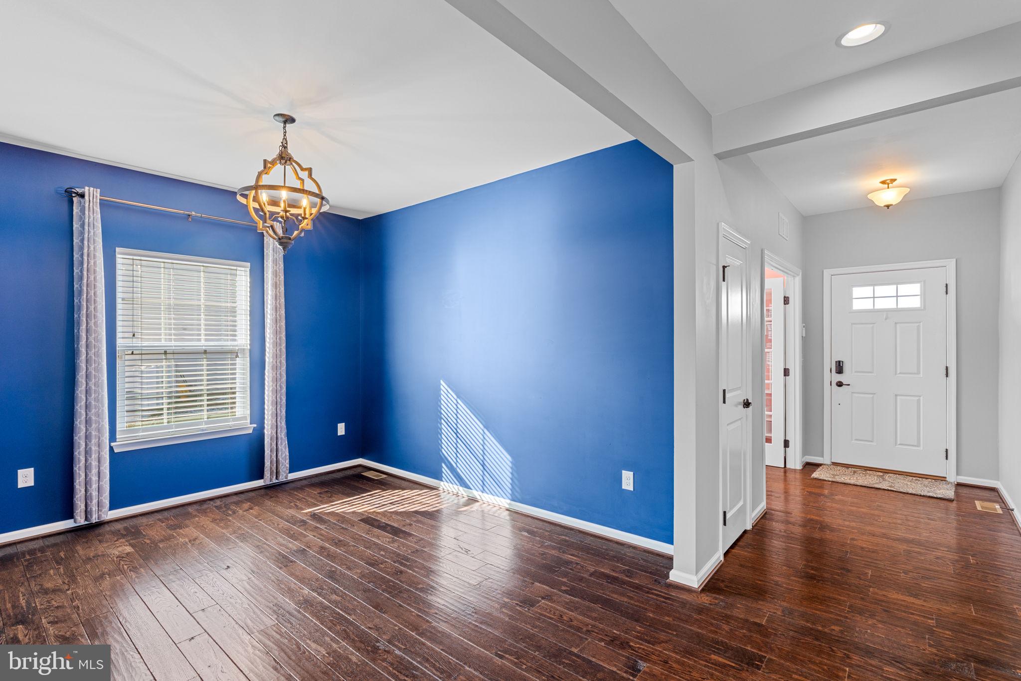 1145 Lynch Circle Warminster, PA 18974 - Photo 24 of 67 an empty room with wooden floor and windows