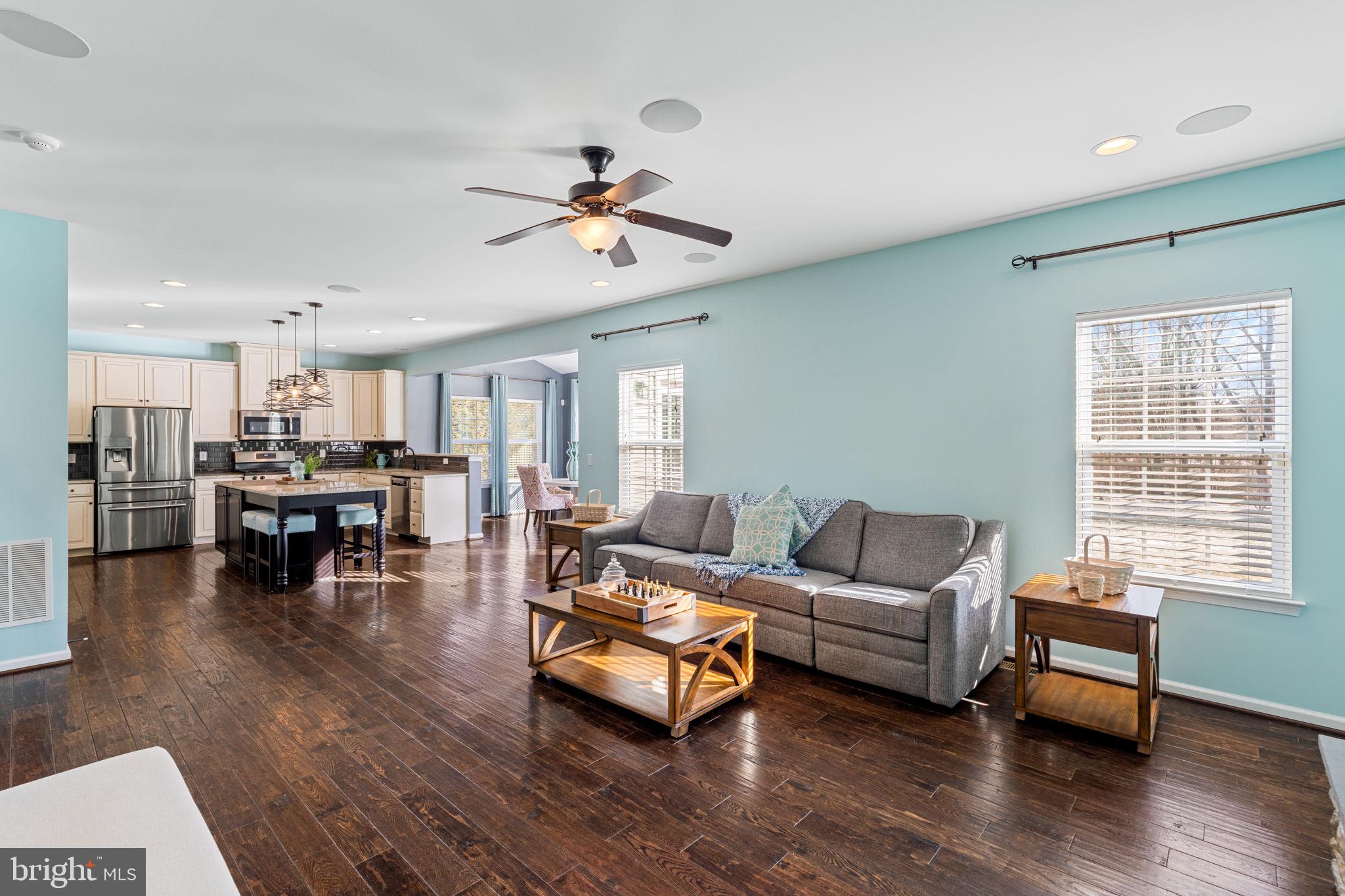 1145 Lynch Circle Warminster, PA 18974 - Photo 28 of 67 a living room with furniture and wooden floor