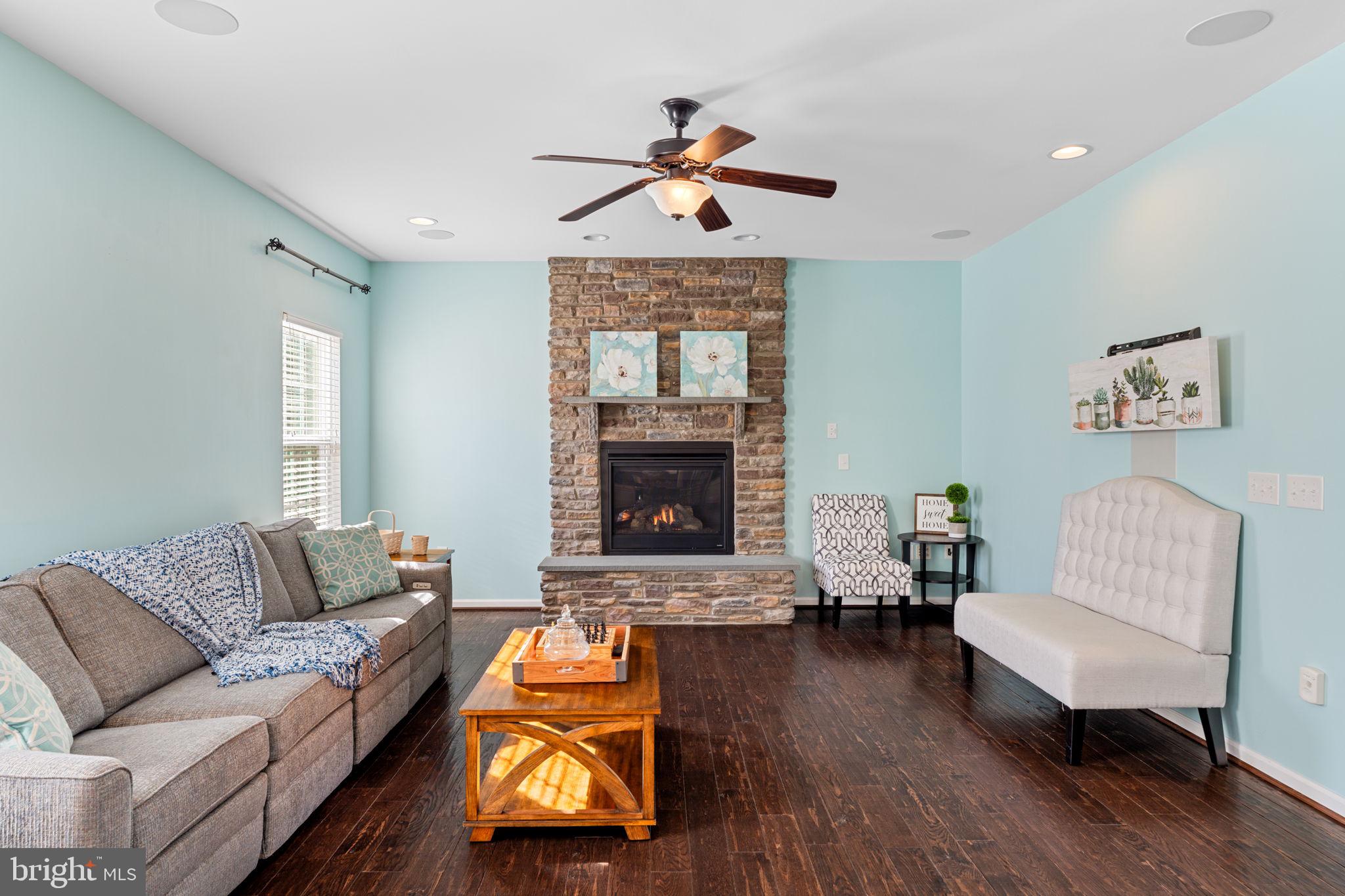 1145 Lynch Circle Warminster, PA 18974 - Photo 30 of 67 a living room with furniture and a fireplace