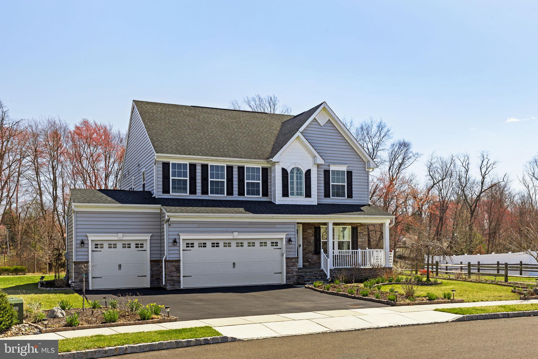 1145 Lynch Circle Warminster, PA 18974 - Photo 3 of 67 a view of a house with a garden and trees