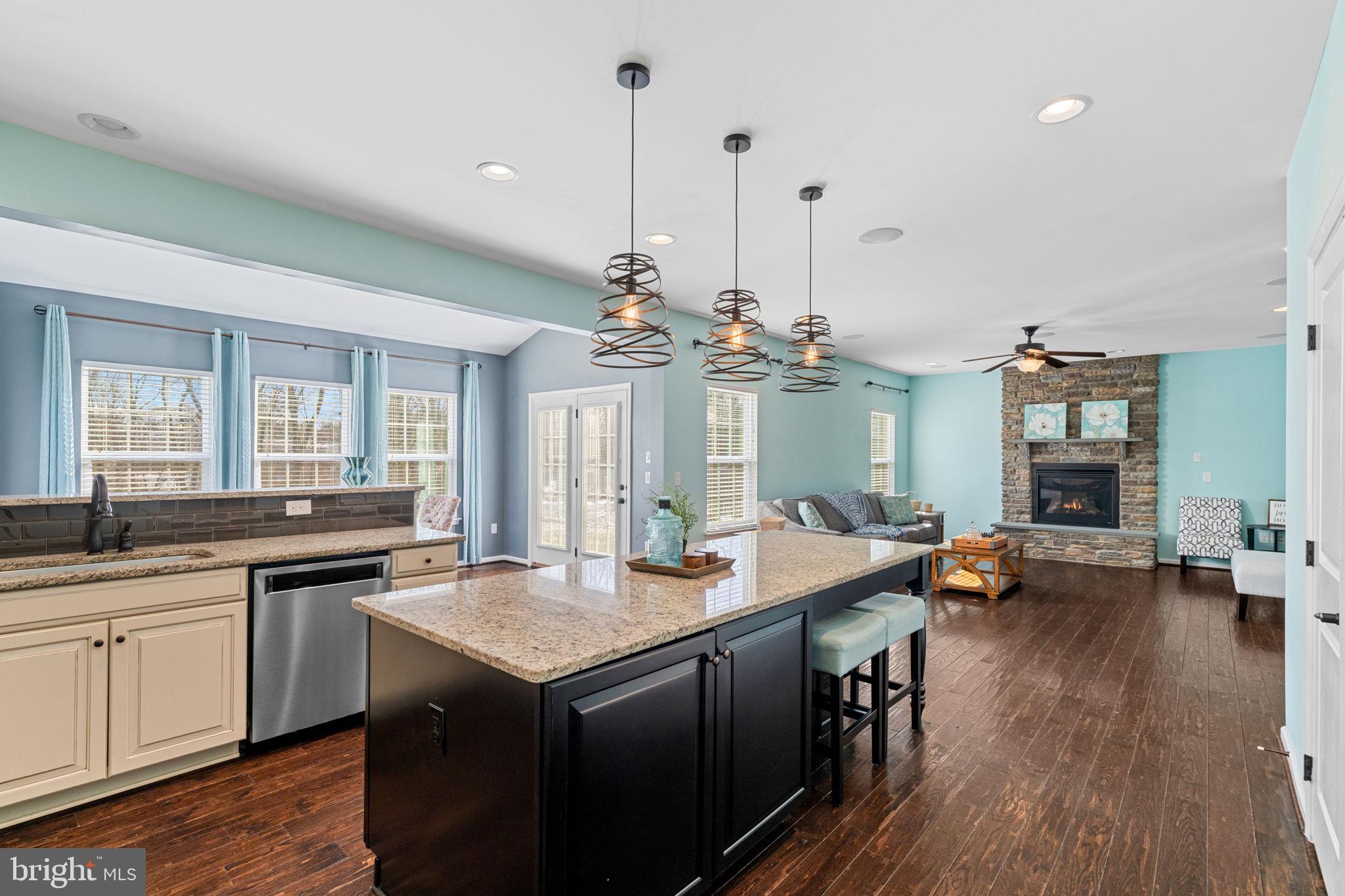 1145 Lynch Circle Warminster, PA 18974 - Photo 36 of 67 a kitchen with a sink stove and wooden floor