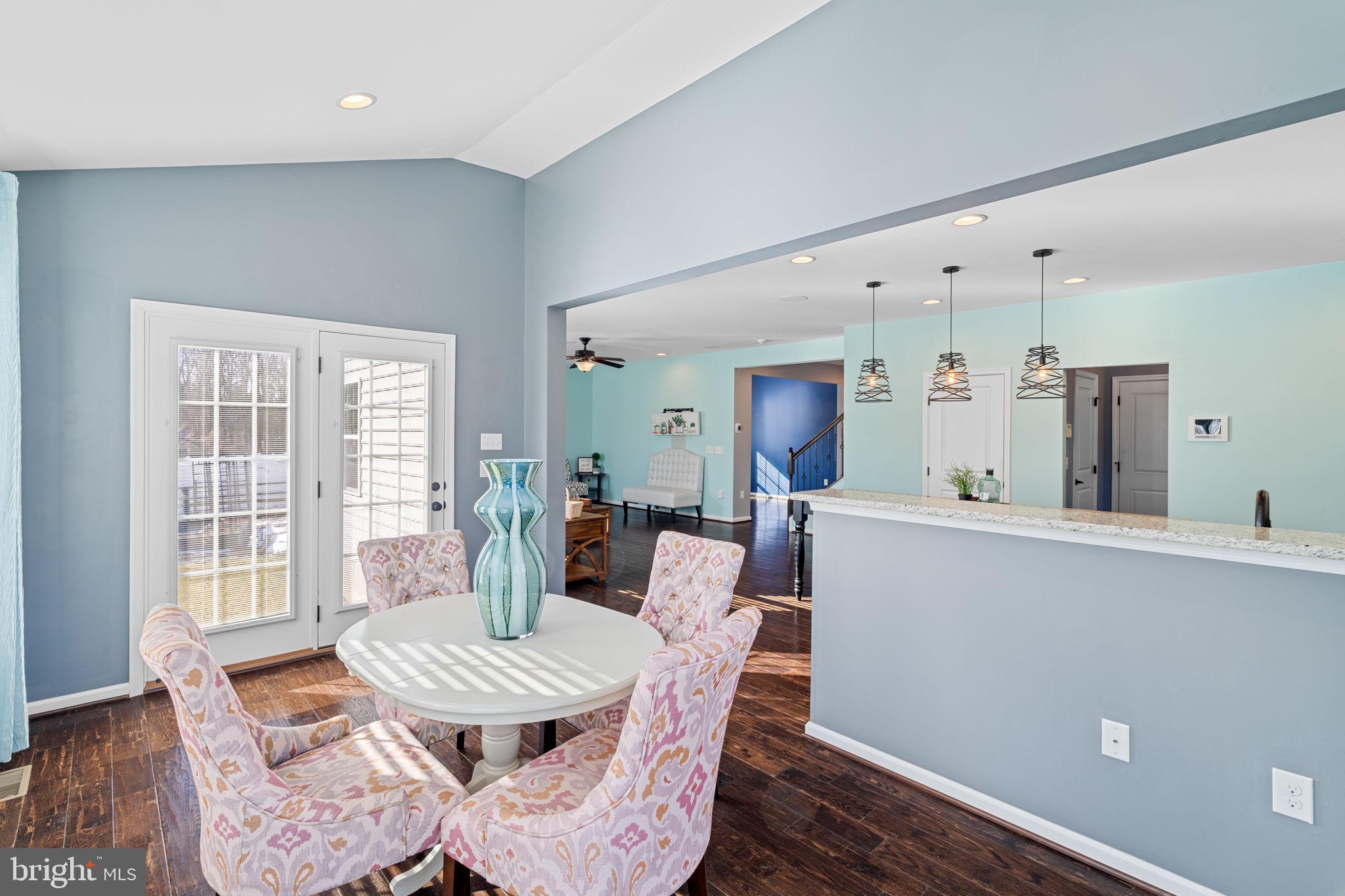 1145 Lynch Circle Warminster, PA 18974 - Photo 38 of 67 a view of a dining room with furniture window and wooden floor