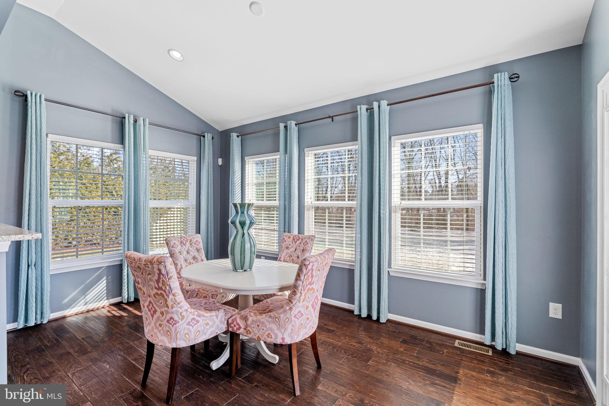1145 Lynch Circle Warminster, PA 18974 - Photo 39 of 67 a view of a dining room with furniture window and wooden floor