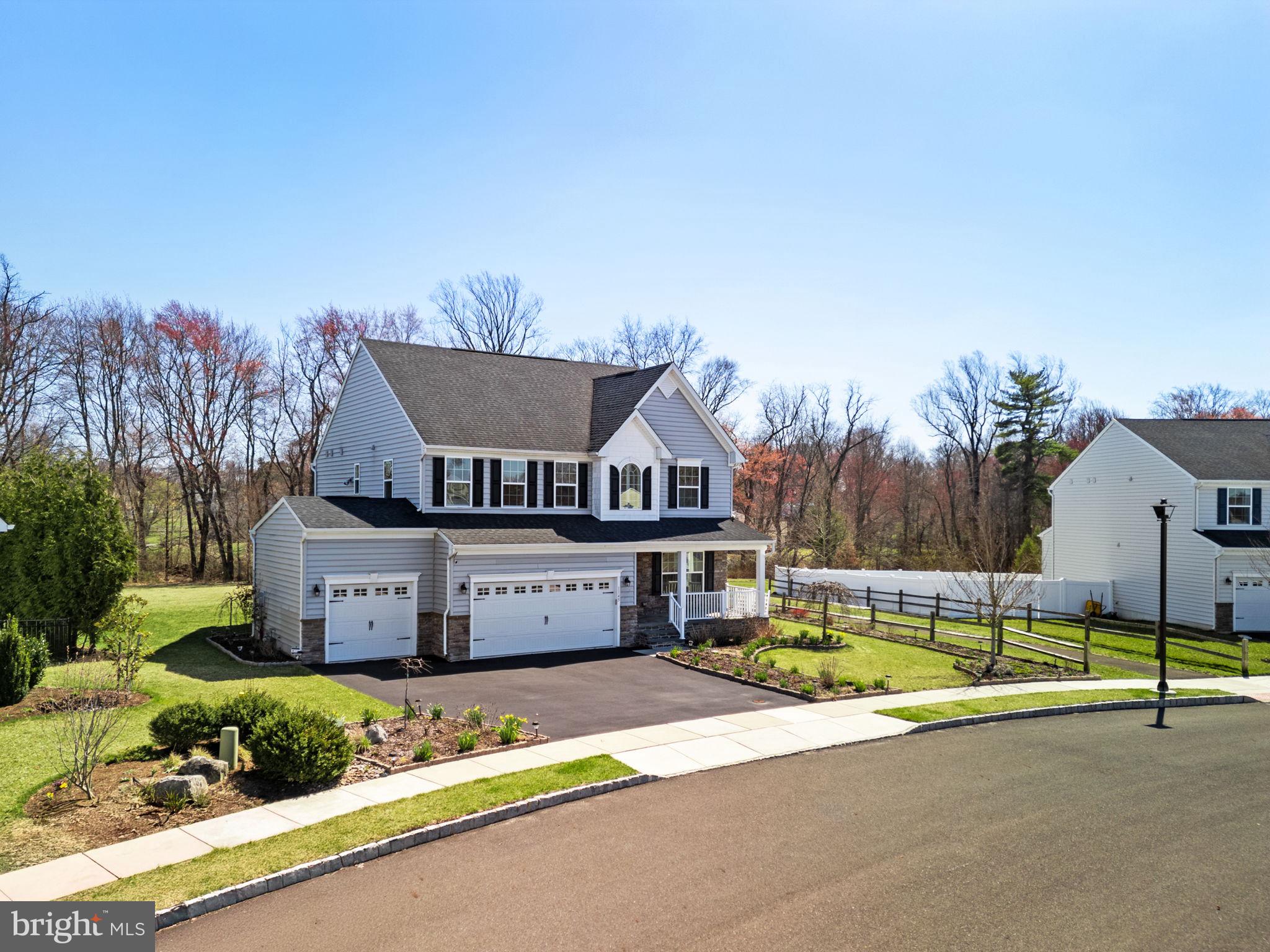 1145 Lynch Circle Warminster, PA 18974 - Photo 4 of 67 a view of a house with a big yard and large trees