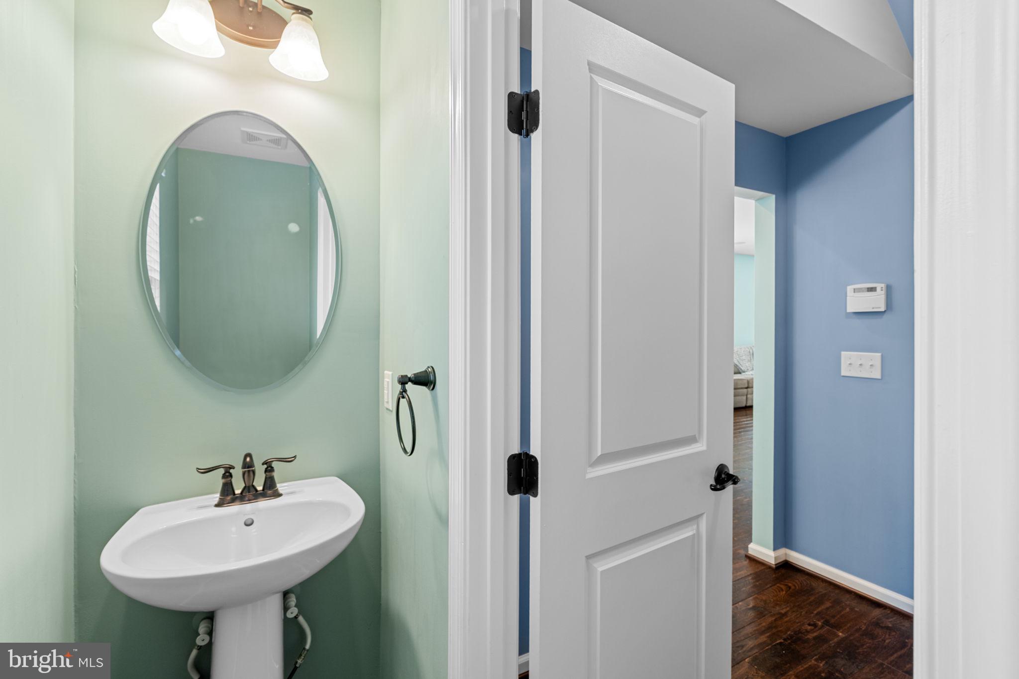 1145 Lynch Circle Warminster, PA 18974 - Photo 41 of 67 a bathroom with a sink and a mirror