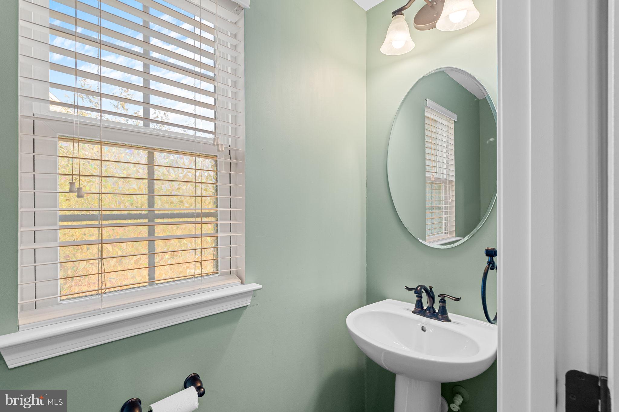 1145 Lynch Circle Warminster, PA 18974 - Photo 42 of 67 a bathroom with a sink and a mirror