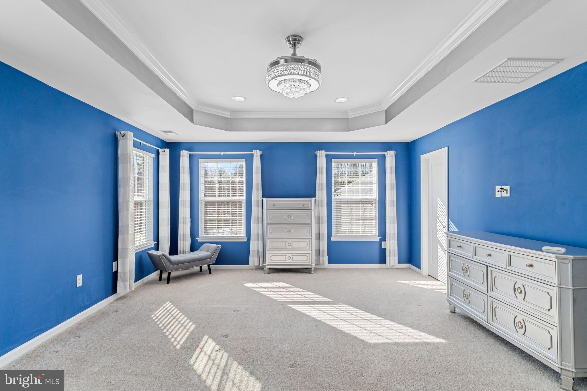 1145 Lynch Circle Warminster, PA 18974 - Photo 56 of 67 a spacious bedroom with a bed and a dresser