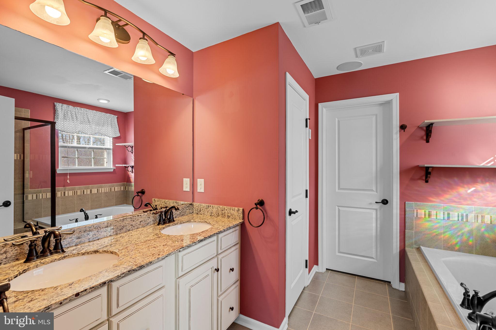 1145 Lynch Circle Warminster, PA 18974 - Photo 59 of 67 a bathroom with a sink vanity granite tub and shower