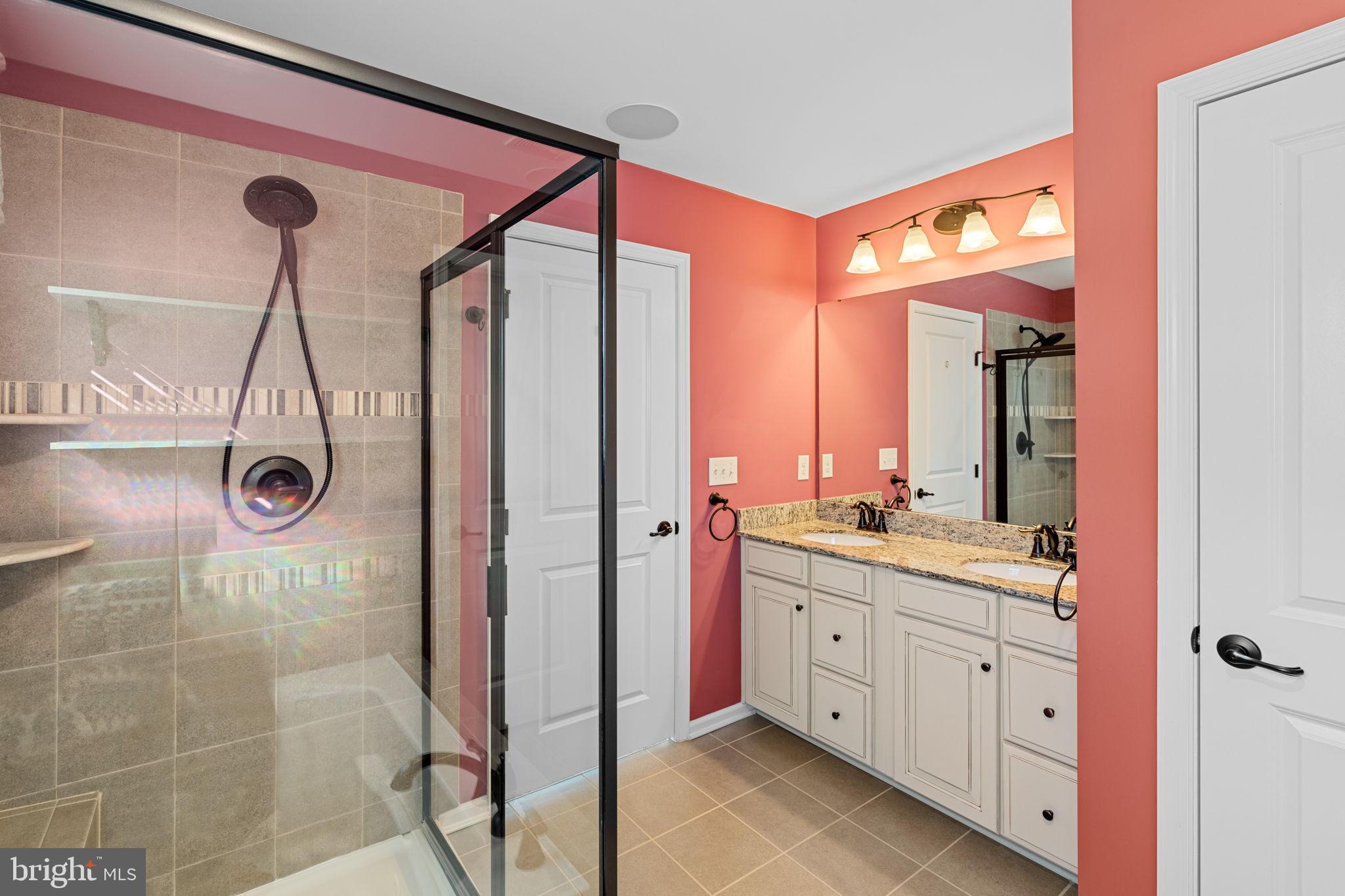 1145 Lynch Circle Warminster, PA 18974 - Photo 62 of 67 a bathroom with a double vanity sink mirror and shower