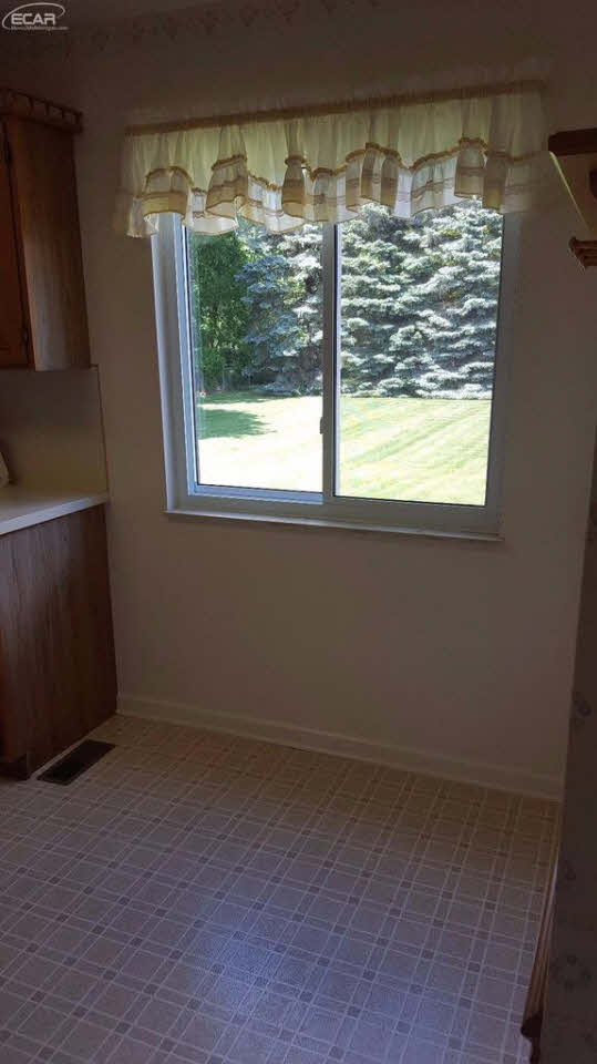 6172 Calkins Road Flint, MI 48532 - Photo 8 of 28 21306332-7.JPG