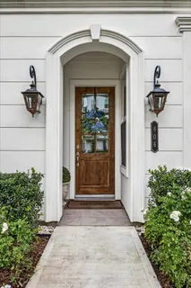 a front view of a house with a door and a window