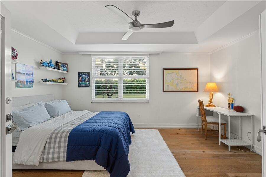 5111 North Ocean Boulevard, Unit A Ocean Ridge, FL 33435 - Photo 13 of 47 a bedroom with a bed and a window