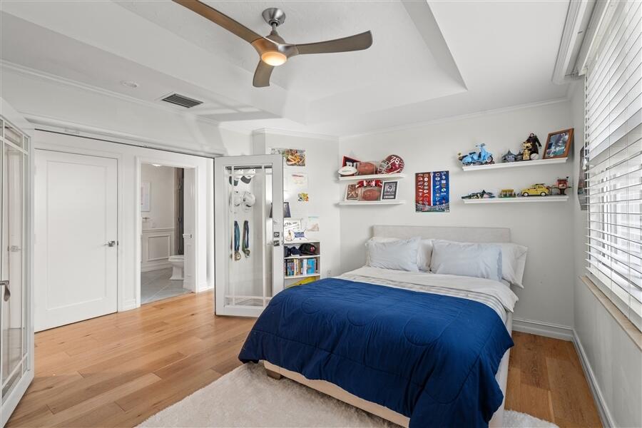 5111 North Ocean Boulevard, Unit A Ocean Ridge, FL 33435 - Photo 14 of 47 a bedroom with a bed and cabinets