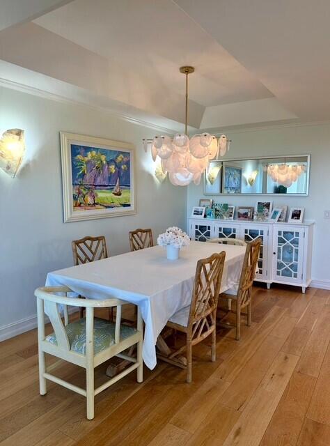 5111 North Ocean Boulevard, Unit A Ocean Ridge, FL 33435 - Photo 17 of 47 a dinning table and chairs in a room