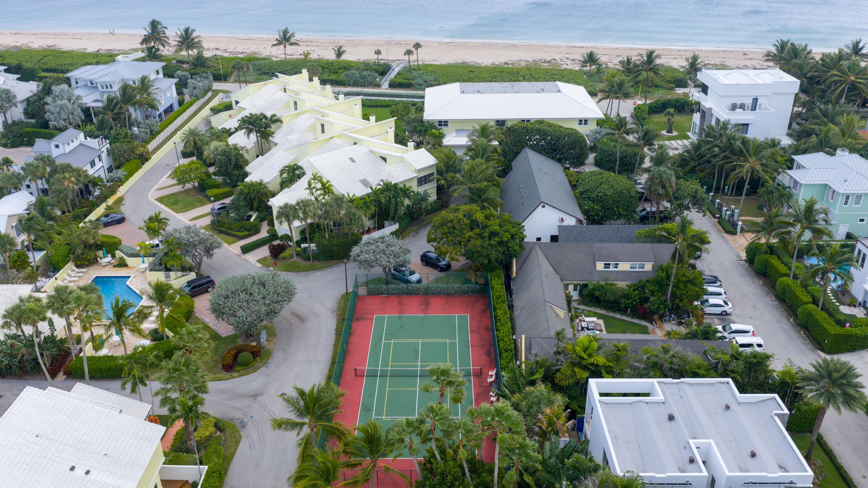 5111 North Ocean Boulevard, Unit A Ocean Ridge, FL 33435 - Photo 2 of 47 an aerial view of a house with a yard and lake view