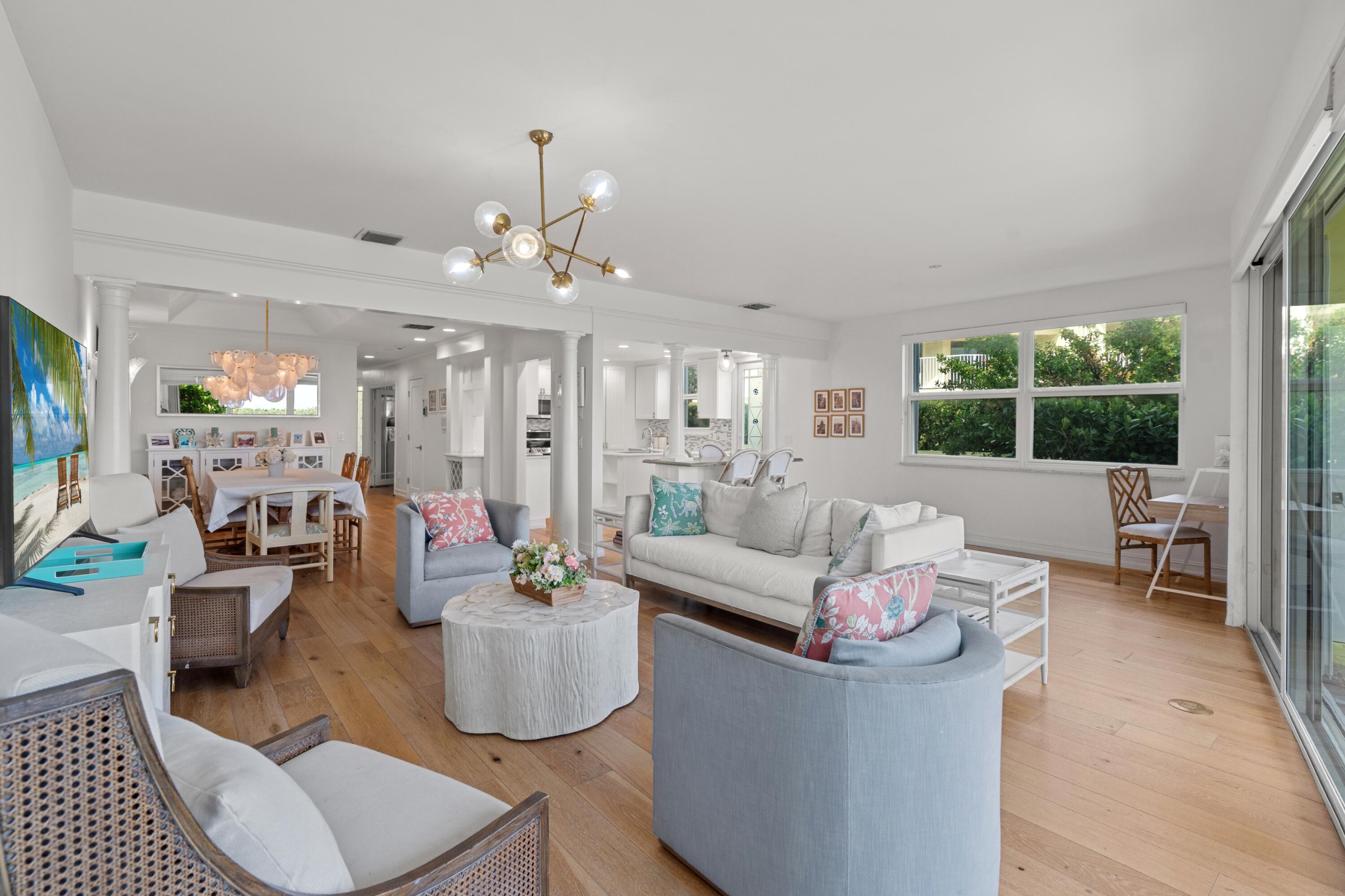 5111 North Ocean Boulevard, Unit A Ocean Ridge, FL 33435 - Photo 25 of 47 a living room with fireplace furniture and a large window