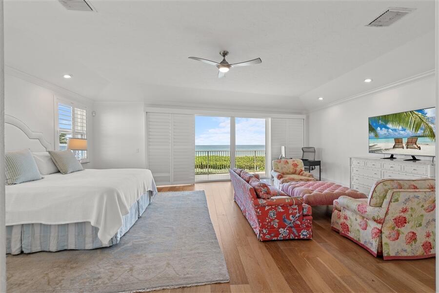 5111 North Ocean Boulevard, Unit A Ocean Ridge, FL 33435 - Photo 28 of 47 a bedroom with furniture and a large window