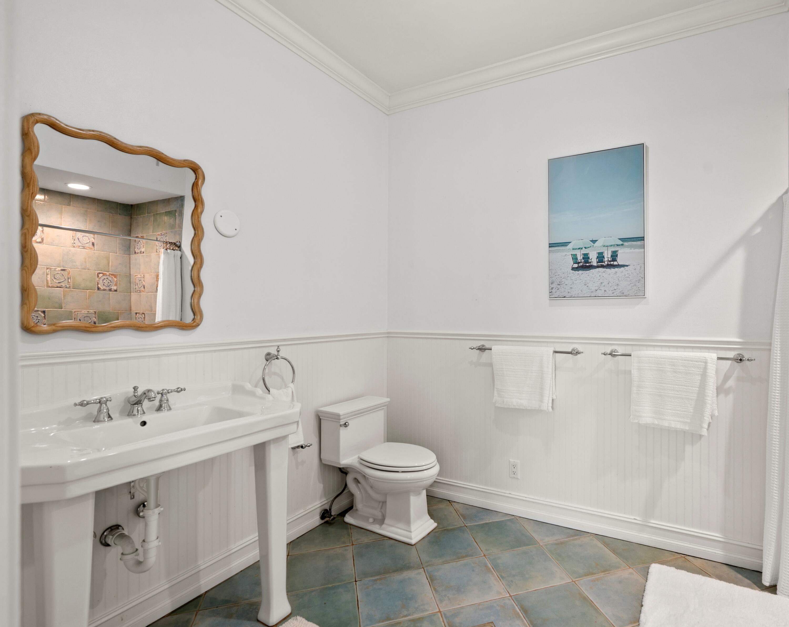 5111 North Ocean Boulevard, Unit A Ocean Ridge, FL 33435 - Photo 33 of 47 a bathroom with a double vanity sink mirror and toilet