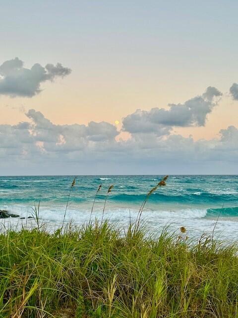 5111 North Ocean Boulevard, Unit A Ocean Ridge, FL 33435 - Photo 43 of 47 a view of a lake with a mountain in the background