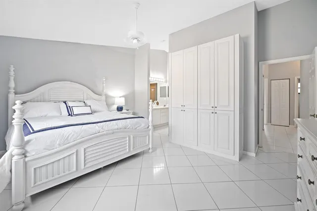 a bathroom with a double vanity sink mirror and