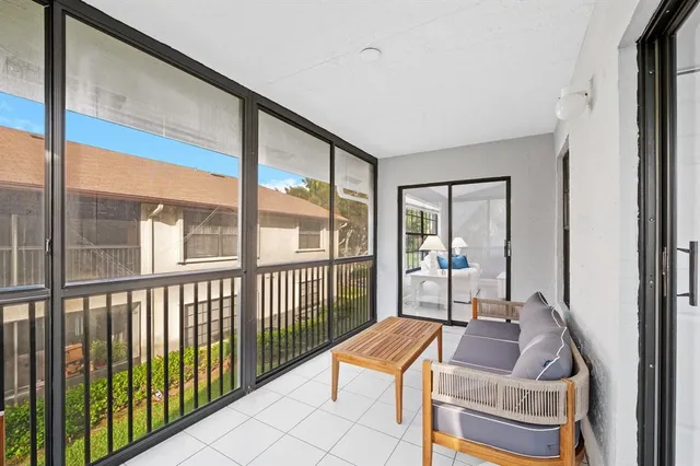 a room with furniture and a window