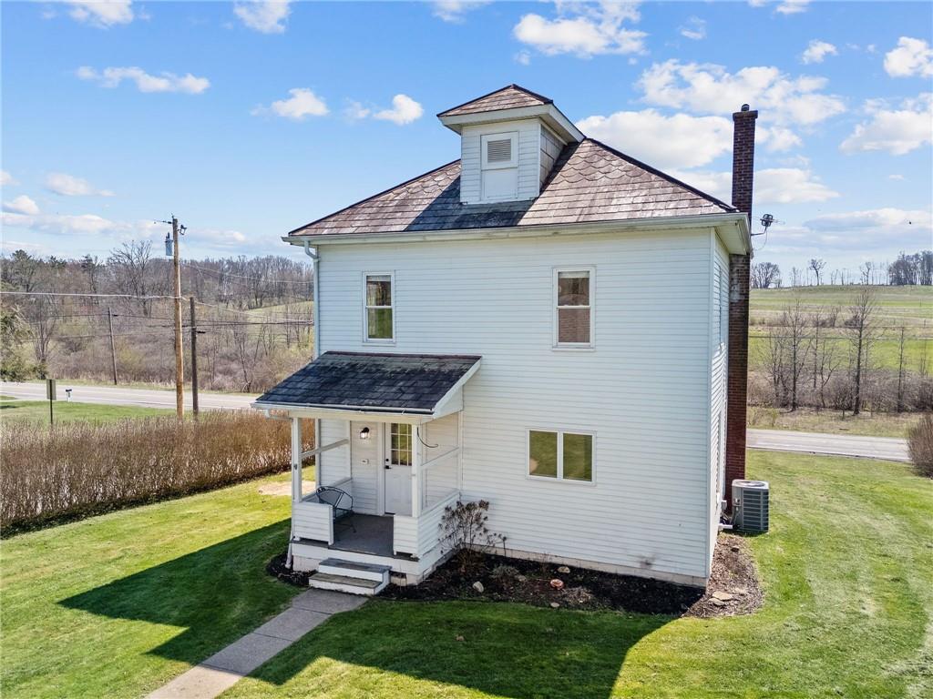 685 Herman Road Butler, PA 16002 - Photo 2 of 43 a front view of a house with garden